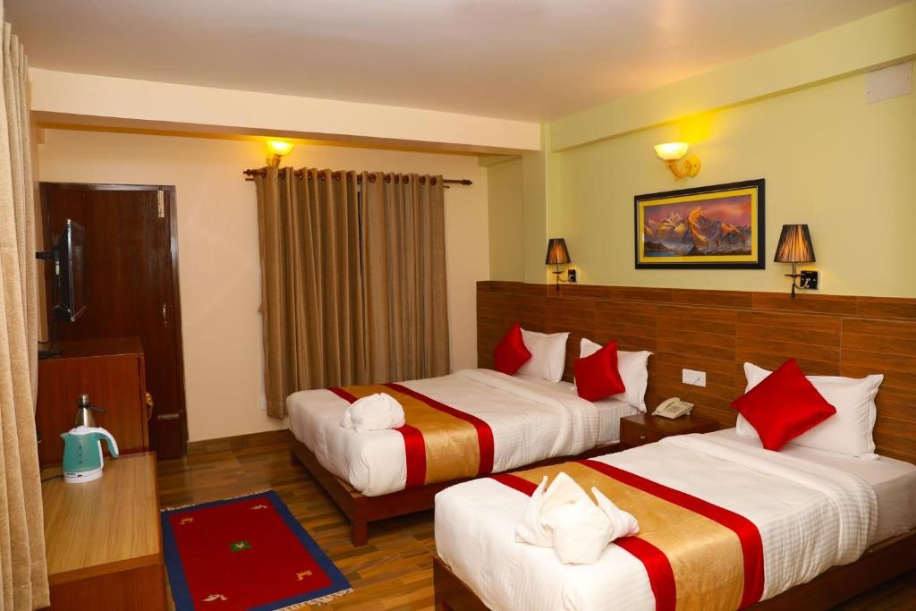 Hotel Guru|Deluxe Triple Room