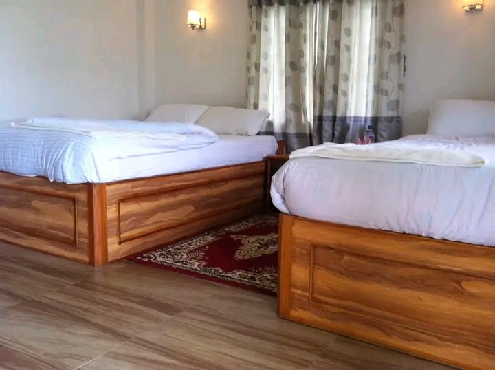 Tharu Mahal|KING AND TWIN DELUXE  ROOM with A/C