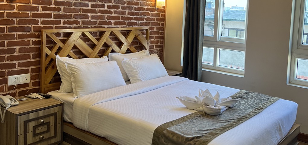 Hotel Kesu Home Private Limited|Deluxe Room