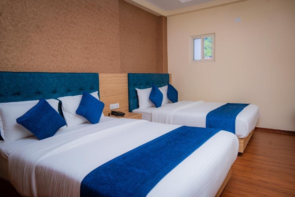 Deluxe Quad Room