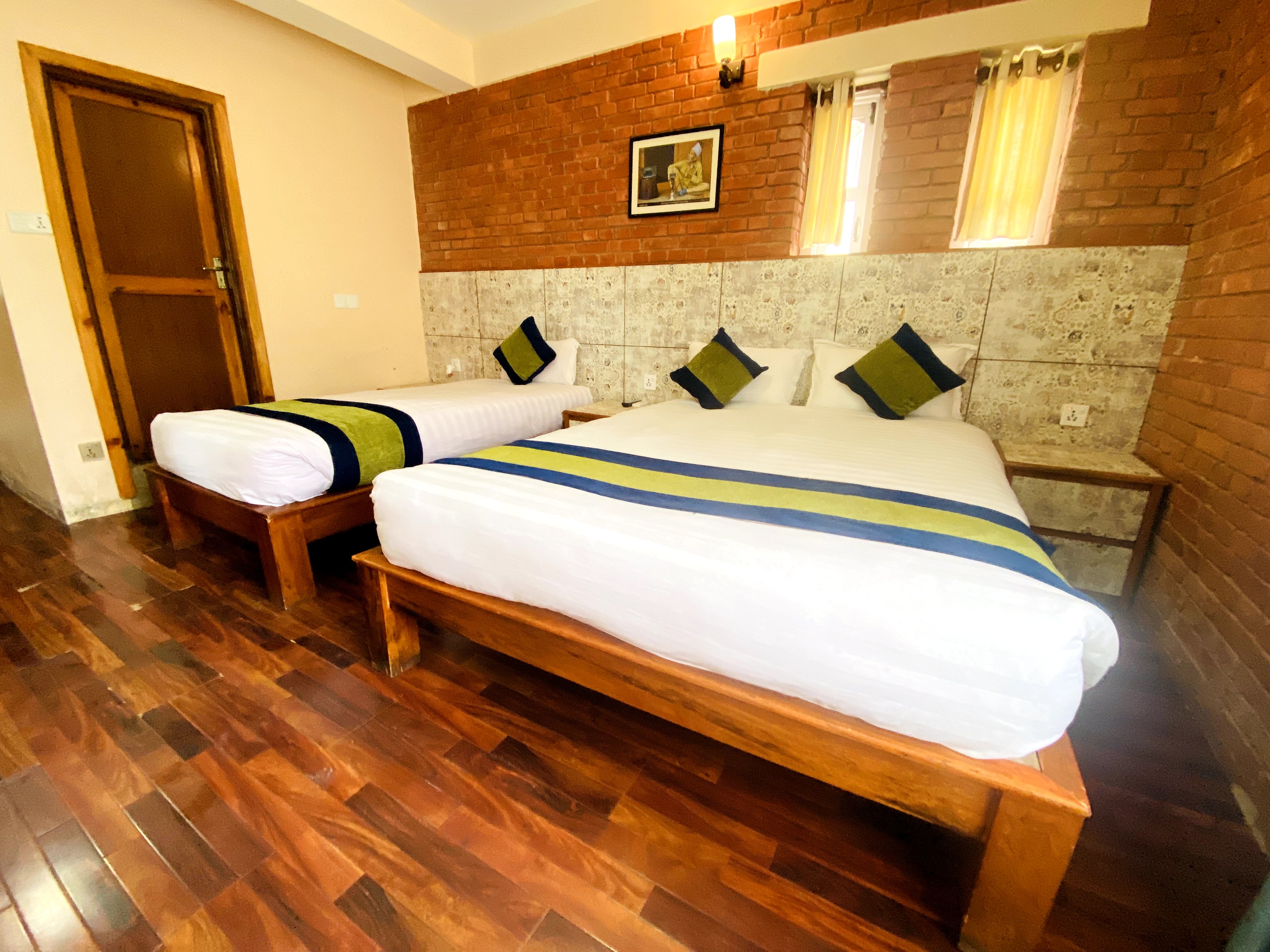 Om Adhyay Retreat Pvt Ltd|Deluxe Quad Room Om Adhyay Retreat Pvt Ltd|Deluxe Quad Room